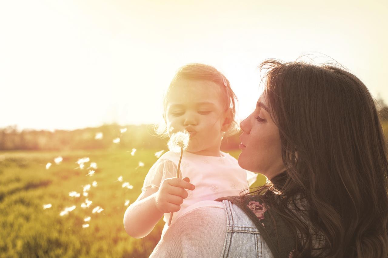 A woman holding her child