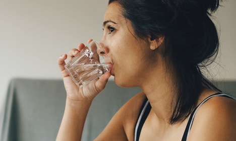 A woman drinking water