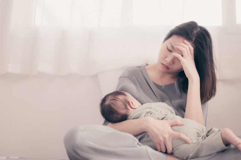 woman struggling with postpartum depression